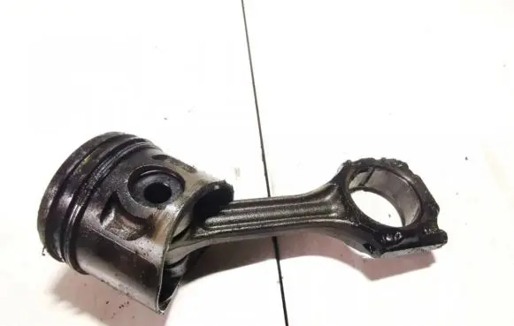 Volkswagen Golf IV Piston with connecting rod 028h