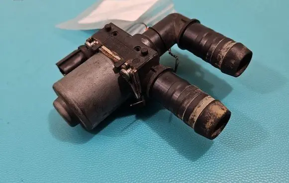 Coolant heater control valve