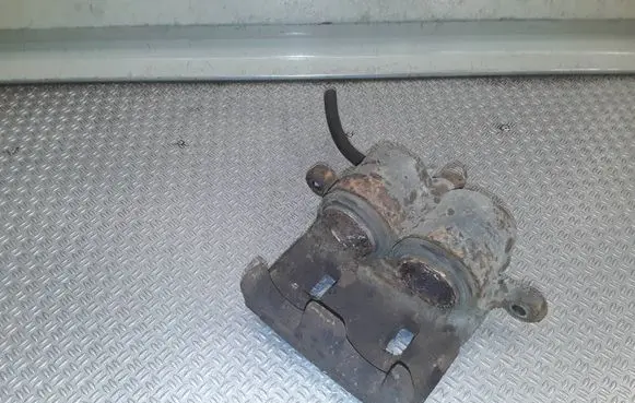 Subaru Impreza III Front brake caliper