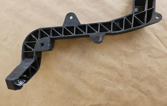 Radiator support slam panel bracket