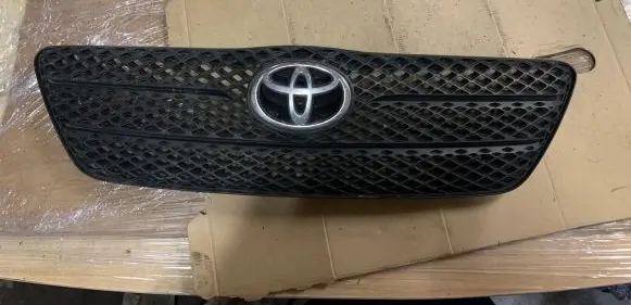 Toyota Corolla E120 E130 Front bumper upper radiator grill 30580010 30581010