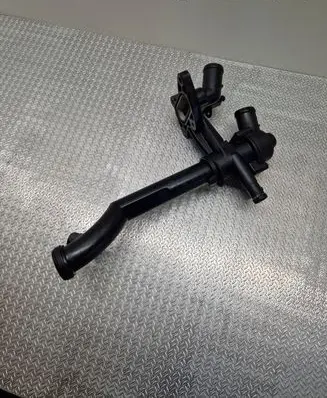 Thermostat/thermostat housing