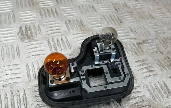 Volkswagen Touareg II Tail light bulb cover holder 