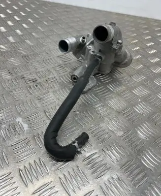 Thermostat/thermostat housing