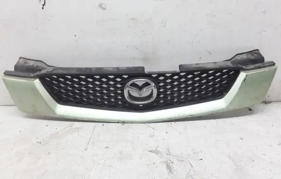 Mazda Demio Front bumper upper radiator grill D34250712