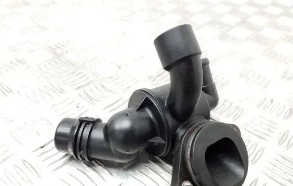 Thermostat/thermostat housing