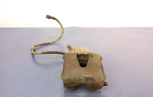 Volkswagen Golf IV Front brake caliper
