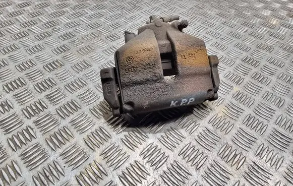 Volkswagen PASSAT B7 Front brake caliper