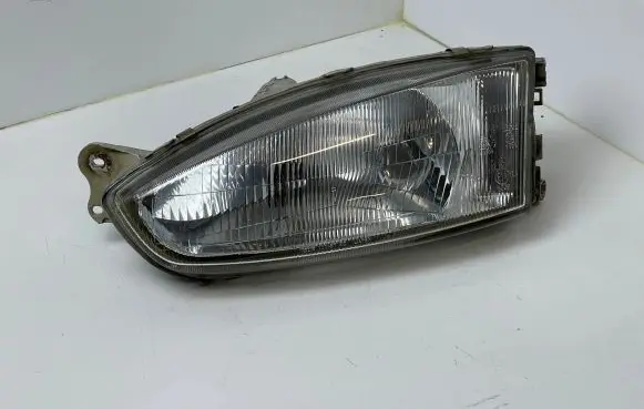 Mitsubishi Colt Headlight/headlamp 10087148