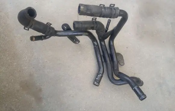 Skoda Superb B8 (3V) Engine coolant pipe/hose 04L121064AF