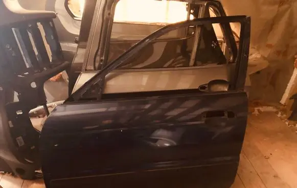 Suzuki Baleno EG Front door