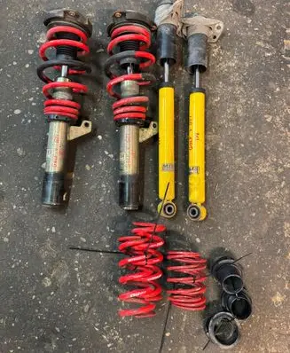 Volkswagen Golf V Front shock absorber with coil spring 32q223213