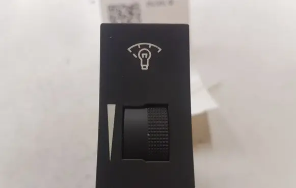 Panel lighting control switch