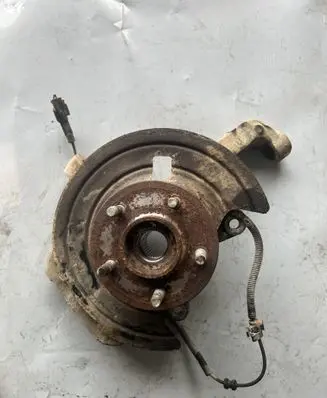 Front wheel hub spindle knuckle