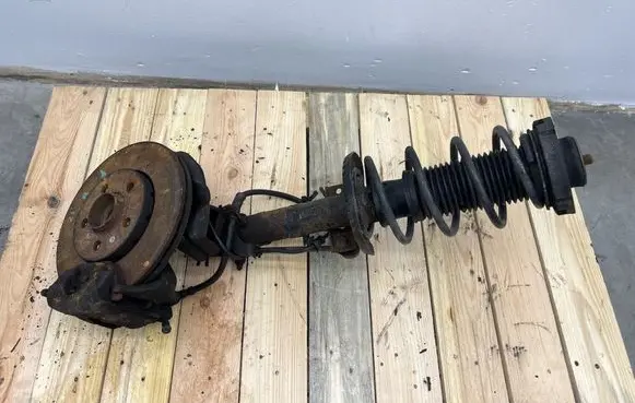 Audi A2 Front shock absorber with coil spring 