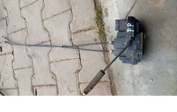 Nissan Quest Front door lock 
