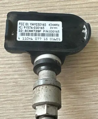 Opel Vivaro Tire pressure sensor YMY030165 8CAA739F 9157A030165