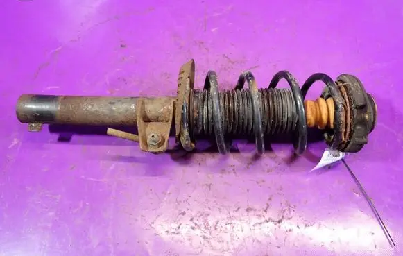Seat Leon (1P) Front shock absorber with coil spring 