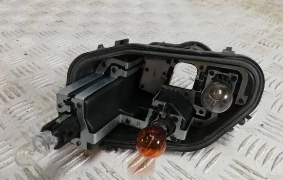 Opel Corsa F Tail light bulb cover holder