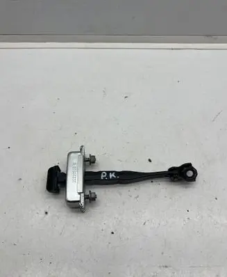 Front door check strap stopper