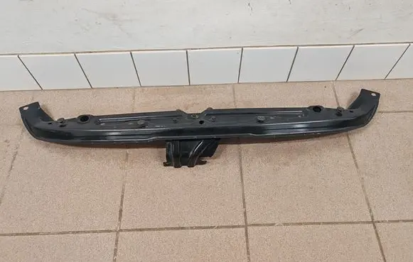 Top upper radiator support slam panel