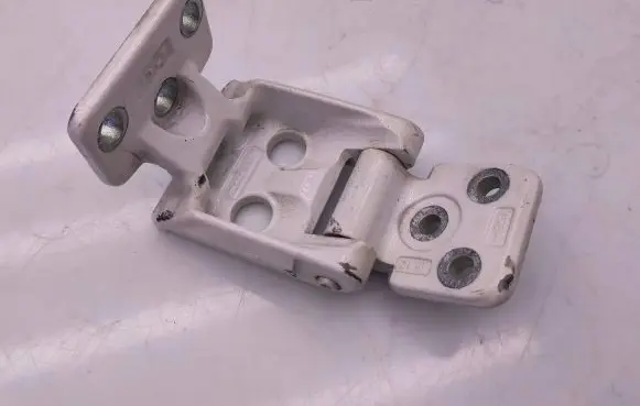 Rear door upper hinge