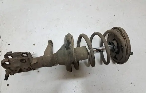 Honda FR-V Front shock absorber with coil spring