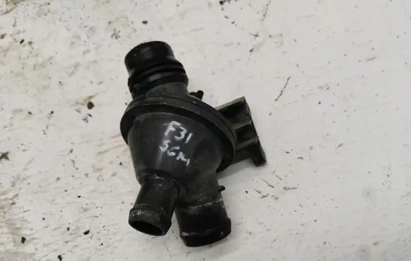 Thermostat/thermostat housing