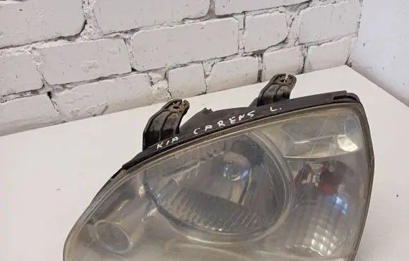 KIA Carens I Headlight/headlamp 8363857