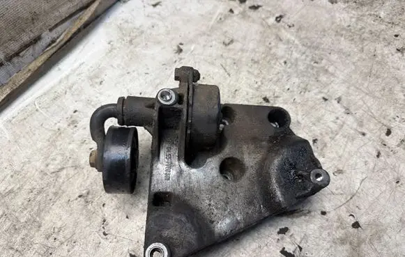 BMW 3 E46 A/C compressor mount bracket 64557787319