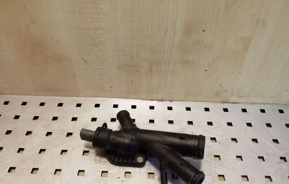 Volkswagen PASSAT B7 Engine coolant pipe/hose 03L121131AA