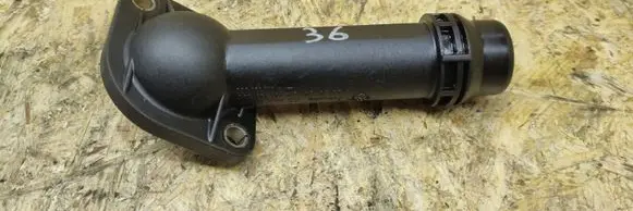 Volkswagen PASSAT B6 Engine coolant pipe/hose 06B121121