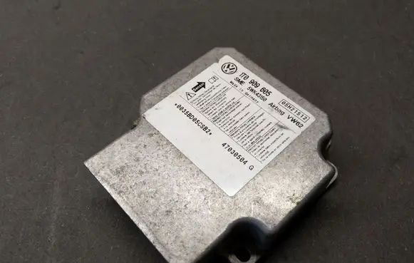 Volkswagen Touran I Airbag control unit/module 1T0909605