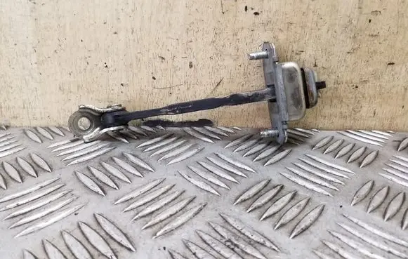 Subaru Outback Rear door check strap stopper