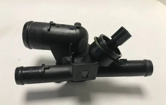 Thermostat/thermostat housing