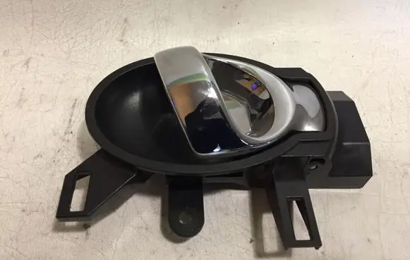 Nissan Juke I F15 Front door interior handle