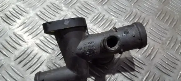 Volkswagen Golf IV Engine coolant pipe/hose 06a121133j