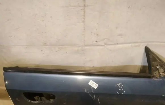 Subaru Legacy Front door glass trim molding 