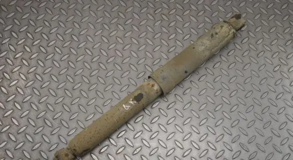 Dodge RAM 1500 DS Rear shock absorber/damper 68216985AB