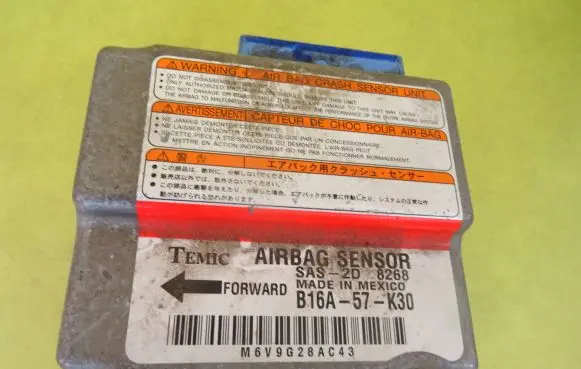 Mazda 323 Airbag control unit/module B16A-57-K30 B16A57K30
