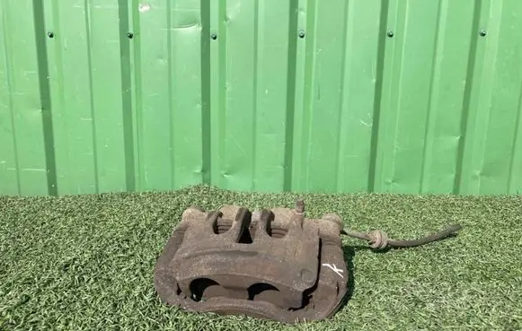 Opel Movano B Front brake caliper 410105038R