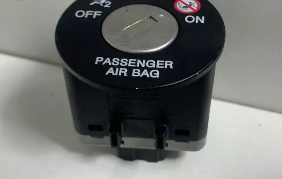 KIA Sportage Passenger airbag on/off switch 
