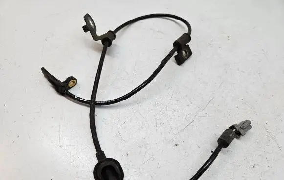 Subaru Legacy ABS brake wheel speed sensor 27540AG11