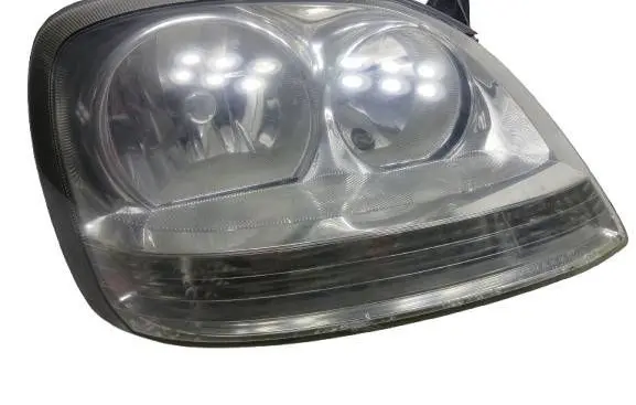 Nissan Almera Tino Headlight/headlamp 964324-KASACJA 964324