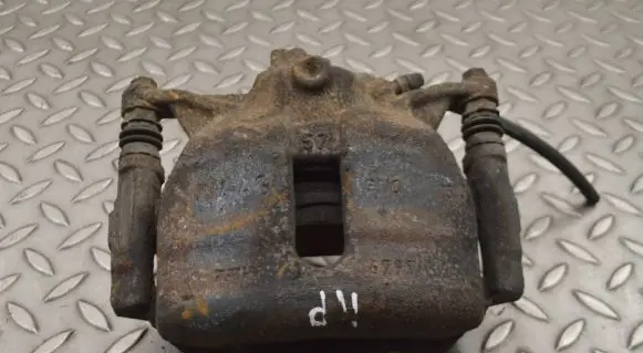 Volkswagen Golf VII Front brake caliper