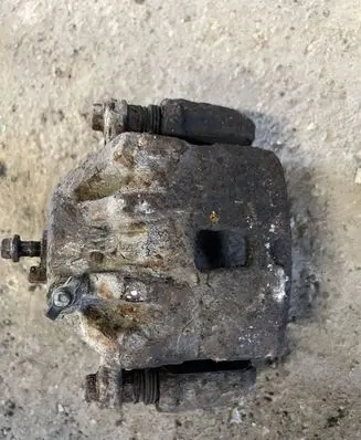 Hyundai Tucson JM Front brake caliper