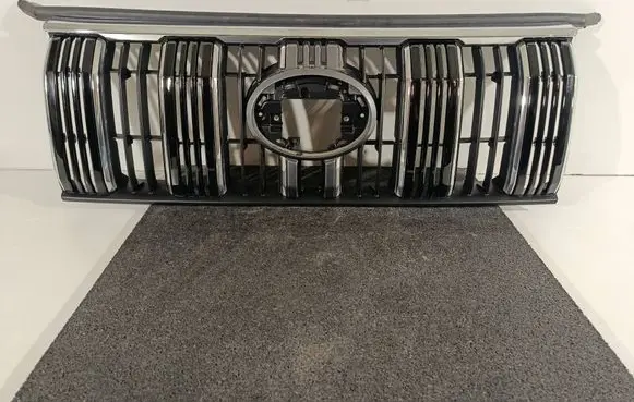 Toyota Land Cruiser (J150) Front bumper upper radiator grill 5310160J20 5311160010 5310160955