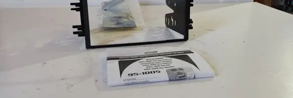 KIA Sorento Radio/GPS head unit trim RADIJOSRMELIS 2DIN