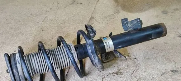 Volvo V50 Front shock absorber with coil spring 22112880