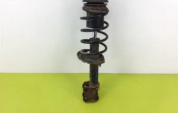 Opel Corsa C Front shock absorber with coil spring